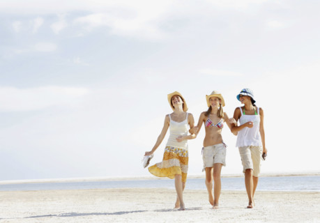 Friends walking in beach. Date : 2008