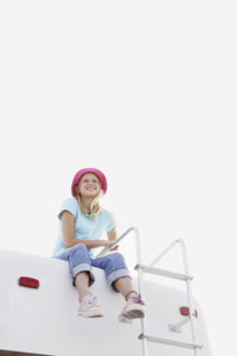Girl sitting on top of motor home. Date : 2008
