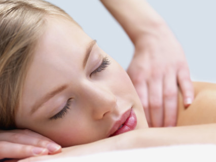 Young woman getting massage. Date : 2008