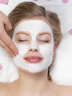 Young woman getting facial spa treatment. Date : 2008