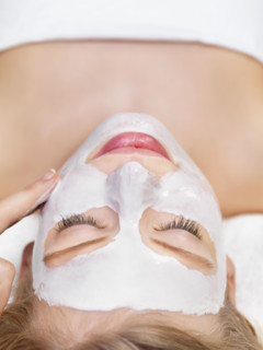 Young woman getting facial spa treatment. Date : 2008