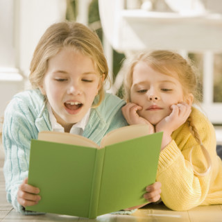 Sisters reading on porch. Date : 2008