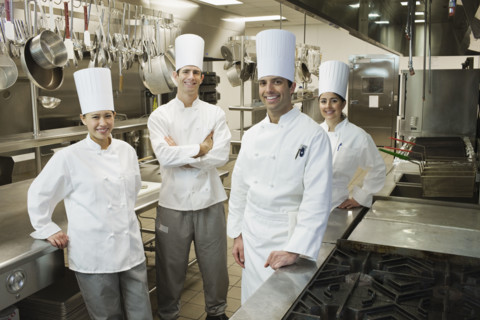 Chefs posing in kitchen. Date : 2008