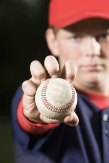Baseball pitcher holding ball. Date : 2008