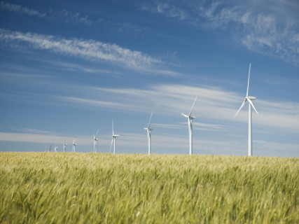 Windmills in a row on wind farm. Date : 2008