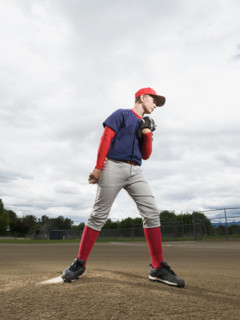 Baseball pitcher getting ready to throw ball. Date : 2008