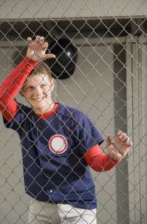 Baseball player standing in dugout. Date : 2008