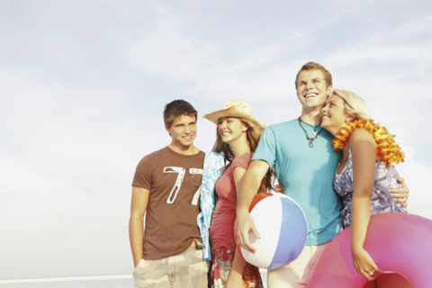 Friends having fun on beach. Date : 2008