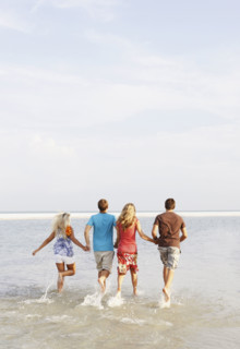 Friends running in ocean. Date : 2008