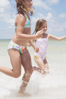 Girls running in ocean. Date : 2008