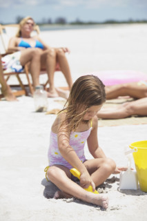 Family vacationing at beach. Date : 2008