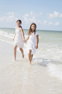 Girls running in ocean. Date : 2008