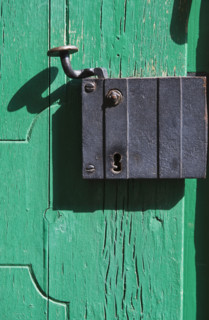 Close up of old door latch in Prague.