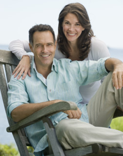 Portrait of couple outdoors.