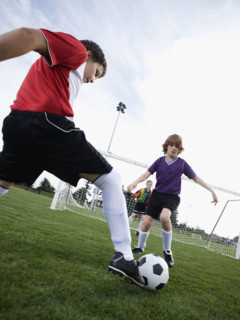 Boys playing competitive soccer. Date : 2008