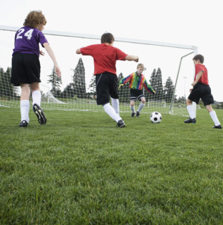 Boys playing competitive soccer. Date : 2008