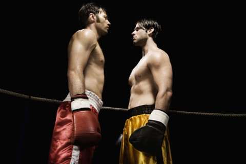 Boxers facing off in boxing ring. Date : 2008
