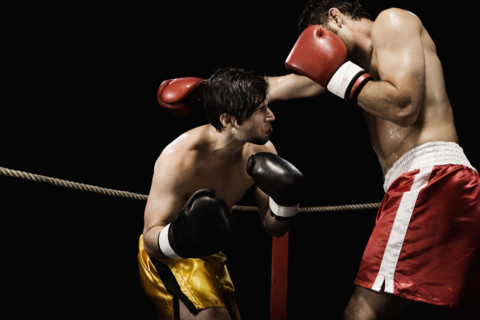 Boxers fighting in boxing ring. Date : 2008