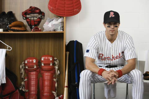 Portrait of baseball player sitting in locker room. Date : 2008