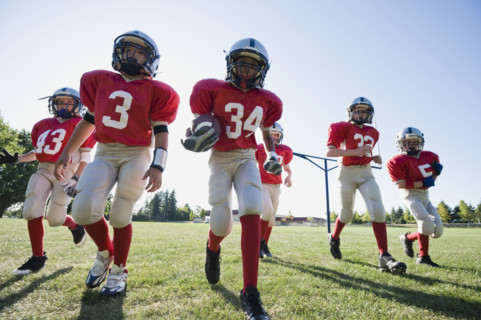 Football players on field. Date: 2008