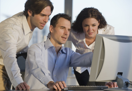 Business people working at computer.