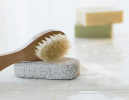 Pumice stone, body brush, and soap.