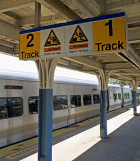 Commuter train arriving at station platform. Date : 2008