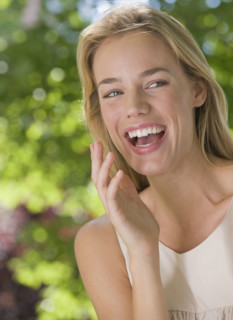 Woman laughing.