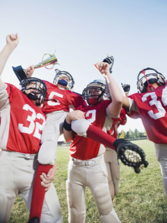 Football team with trophy celebrating. Date: 2008