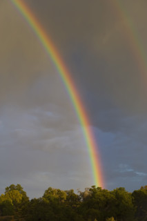 Rainbow and storm clouds, Grand Canyon, Arizona.
