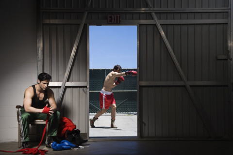 Boxers wrapping hands and practicing. Date : 2008