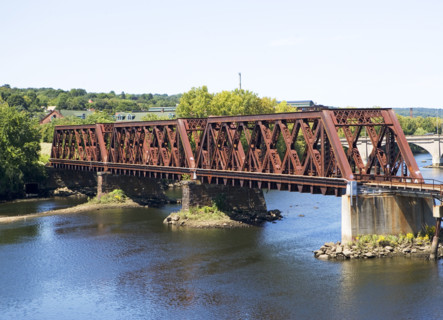 Steel railroad bridge spanning river, Connecticut. Date: 2008