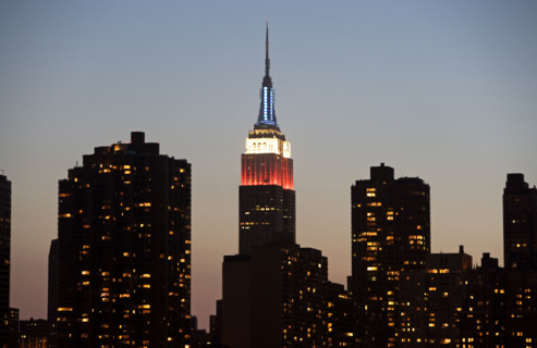 Illuminated Empire State Building at dusk. Date: 2008