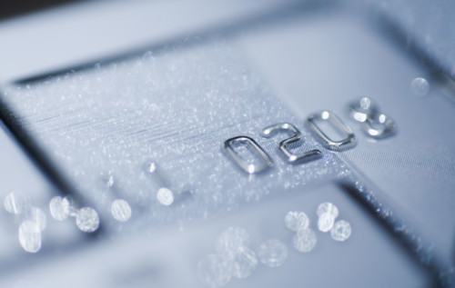 Close up of numbers on credit card.