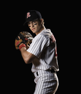 Portrait of pitcher preparing to throw ball. Date : 2008