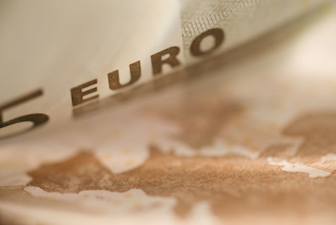 Close up of five euro bill.