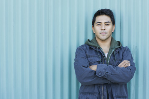 Man posing with arms crossed. Date : 2008