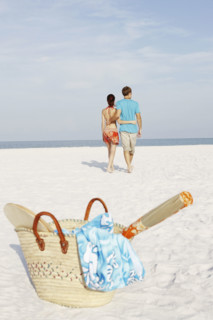Couple walking on beach. Date : 2008