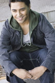 Man sitting on step. Date : 2008