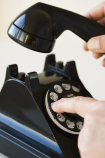 Hand dialing rotary telephone.