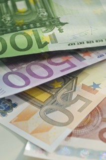 Assorted euro notes and coins.