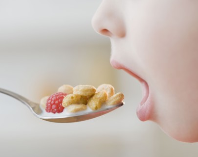 Boy eating cereal.