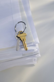 Keys on stack of mail.