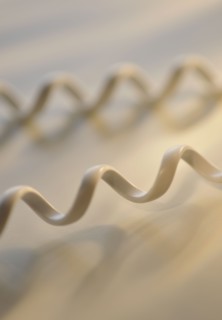 Close up of telephone cord.