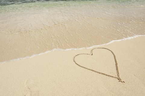 Heart drawn in sand.