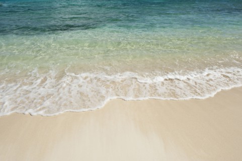 Beach and clear ocean water.