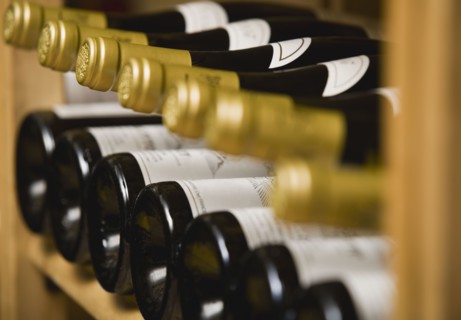 Close up of wine bottles.