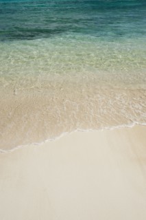 Beach and clear ocean water.