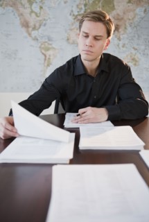 Businessman reviewing documents.