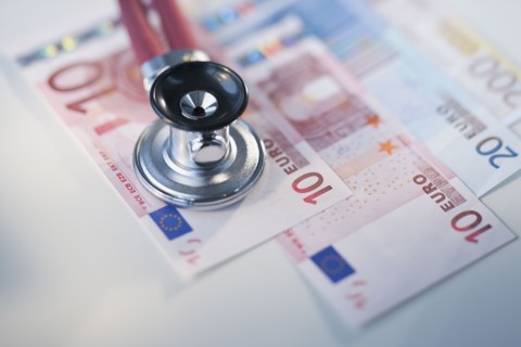 Euros and stethoscope.